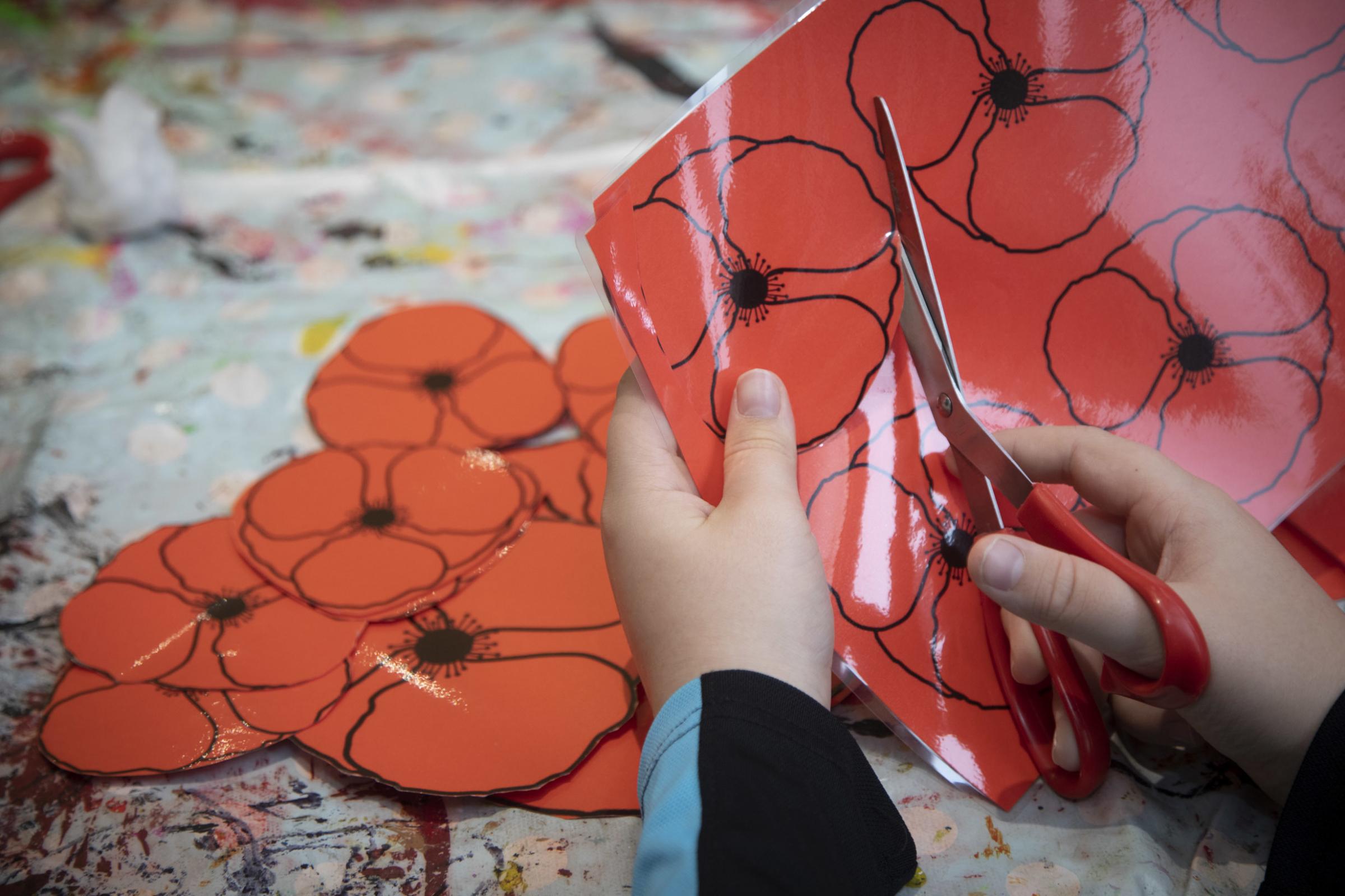 Gwersyllt school pupils during their visit to Pendine Parks Bryn Bella taking part in a craft class on the theme of Remembrance. Picture: Mandy Jones