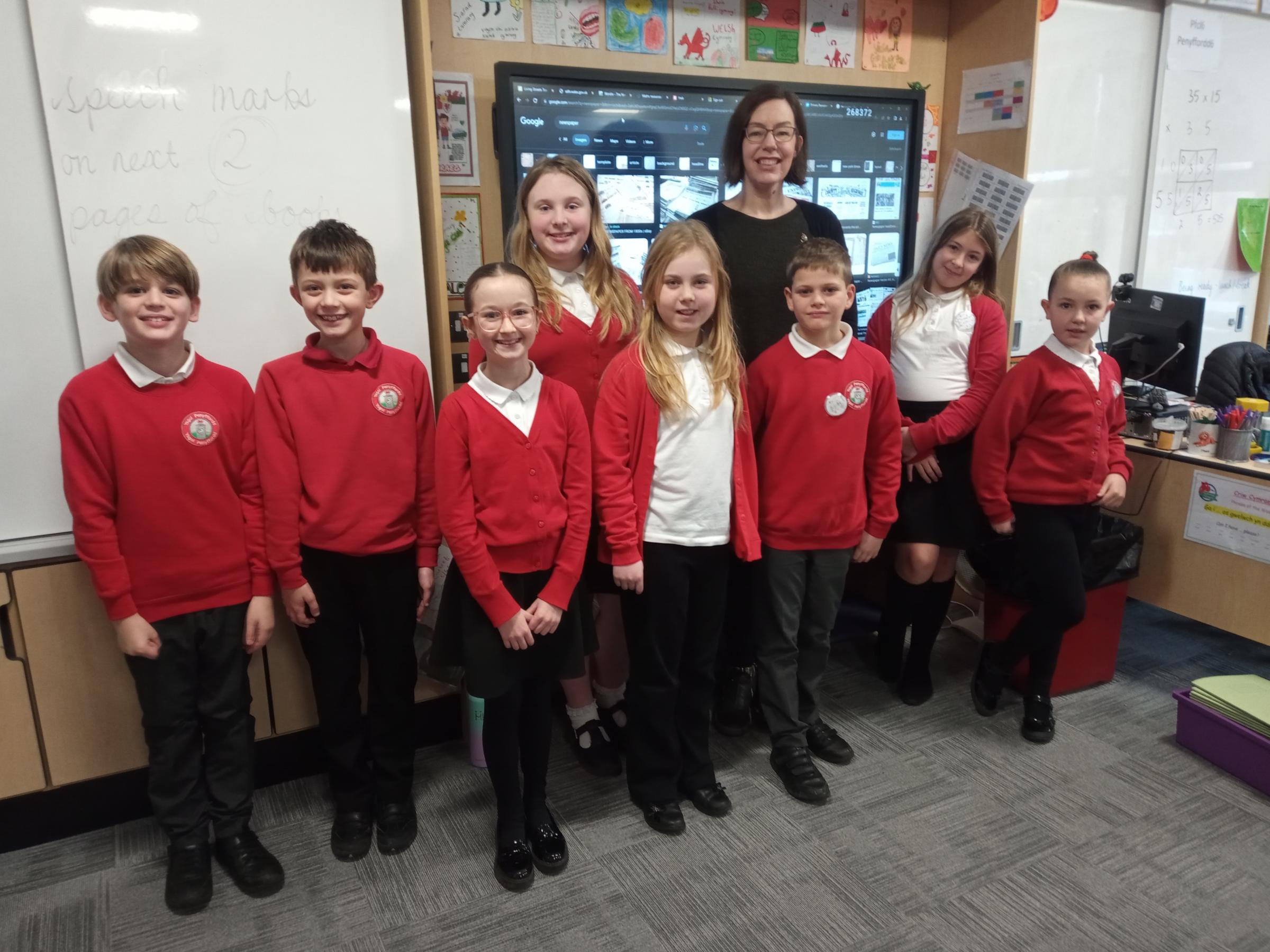 Leader community content editor Claire Pierce, with some of the Ysgol Penyffordd pupils.