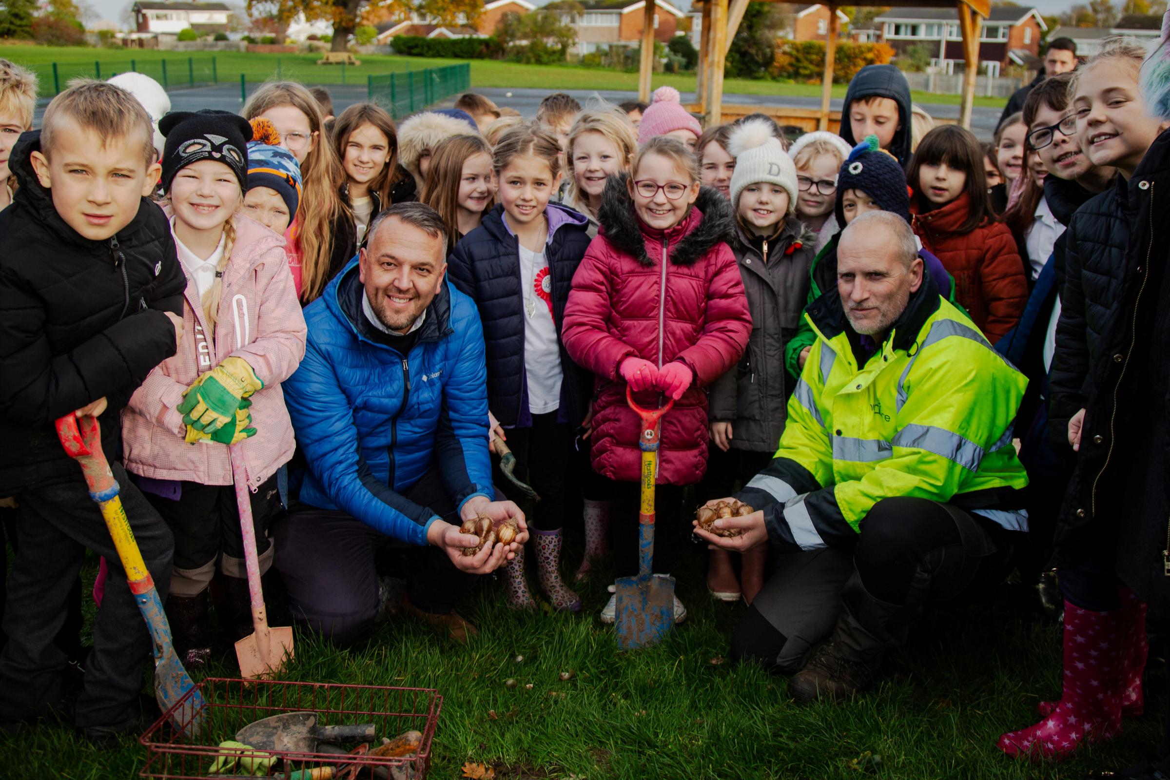 Alan Pruden-Barker, centre manager at Broughton Shopping Park, and Andy Molton, team leader at Nurture, hand-delivered hundreds of bulbs to pupils at Broughton Primary School.
