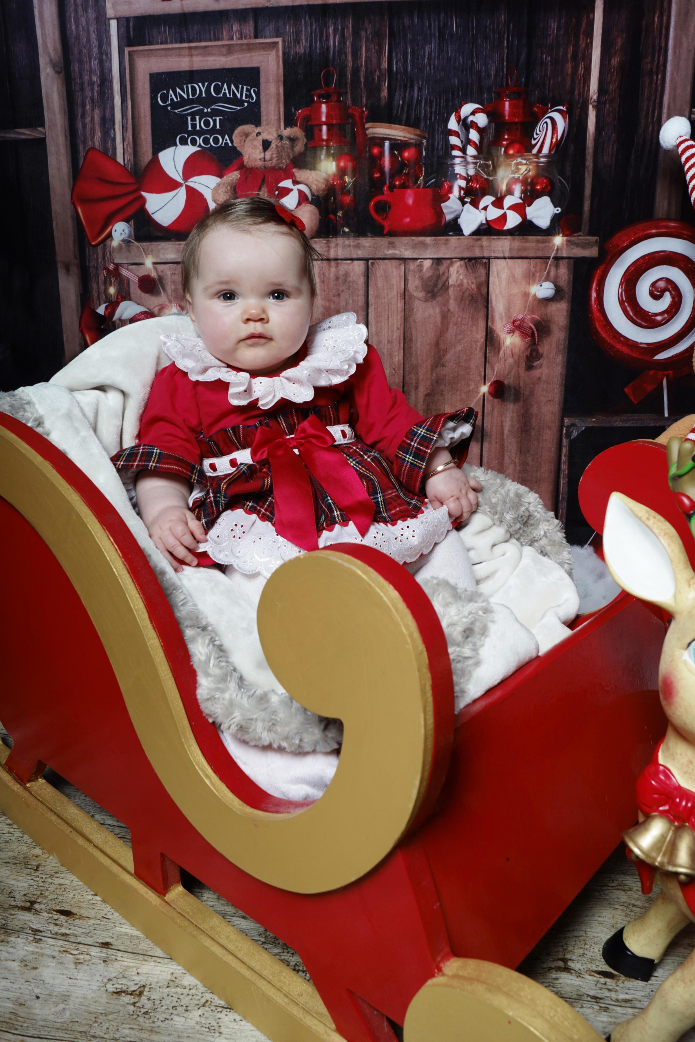 Courtney Gilmartin, from Wrexham: Eight-month-old Eden Dean, having her first Christmas shoot at Broughton.