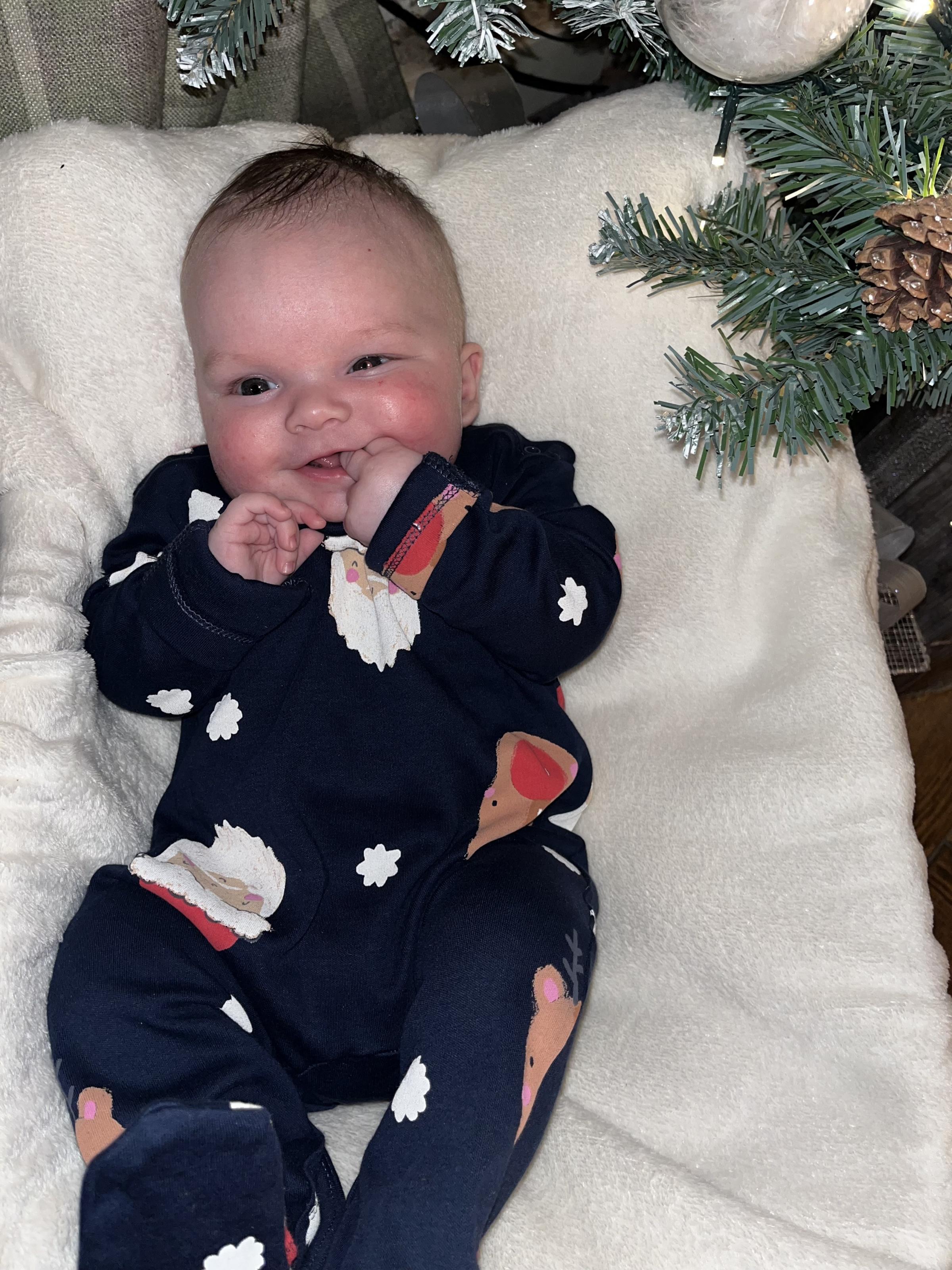 Rhiannon Williams, from Wrexham: Big smiles because three-month-old Ezra is matching with his big brother and sister in their Christmas pyjamas.