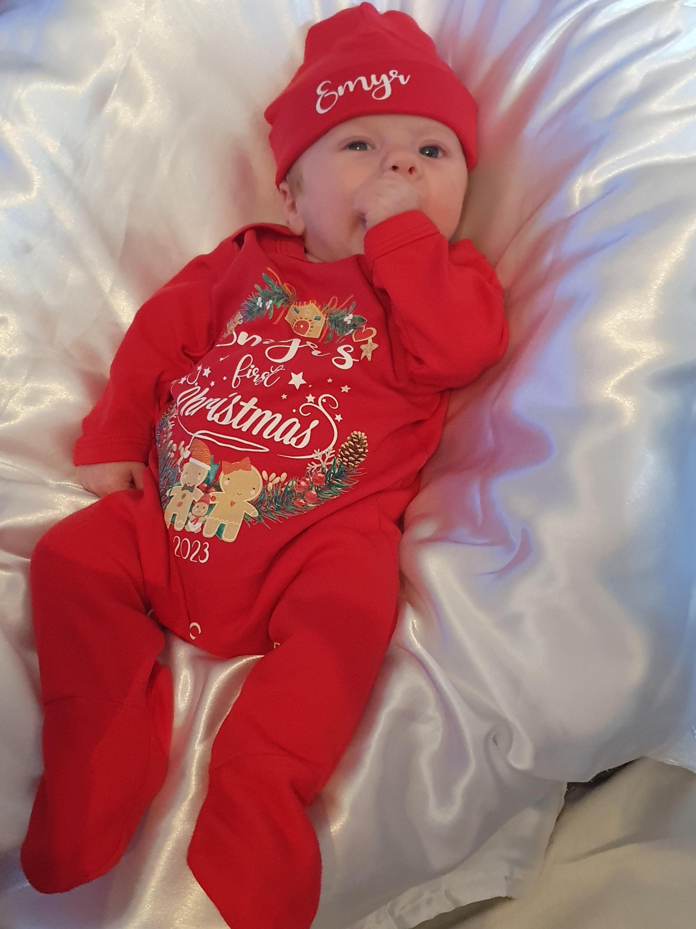 Charlotte Jones, from Acrefair in Wrexham: Two-month-old Emyr Timothy Moulsdale in his first Christmas outfit. Mum Lottie, dad Keiran and big sister Lilly are looking forward to Christmas, as family of four.