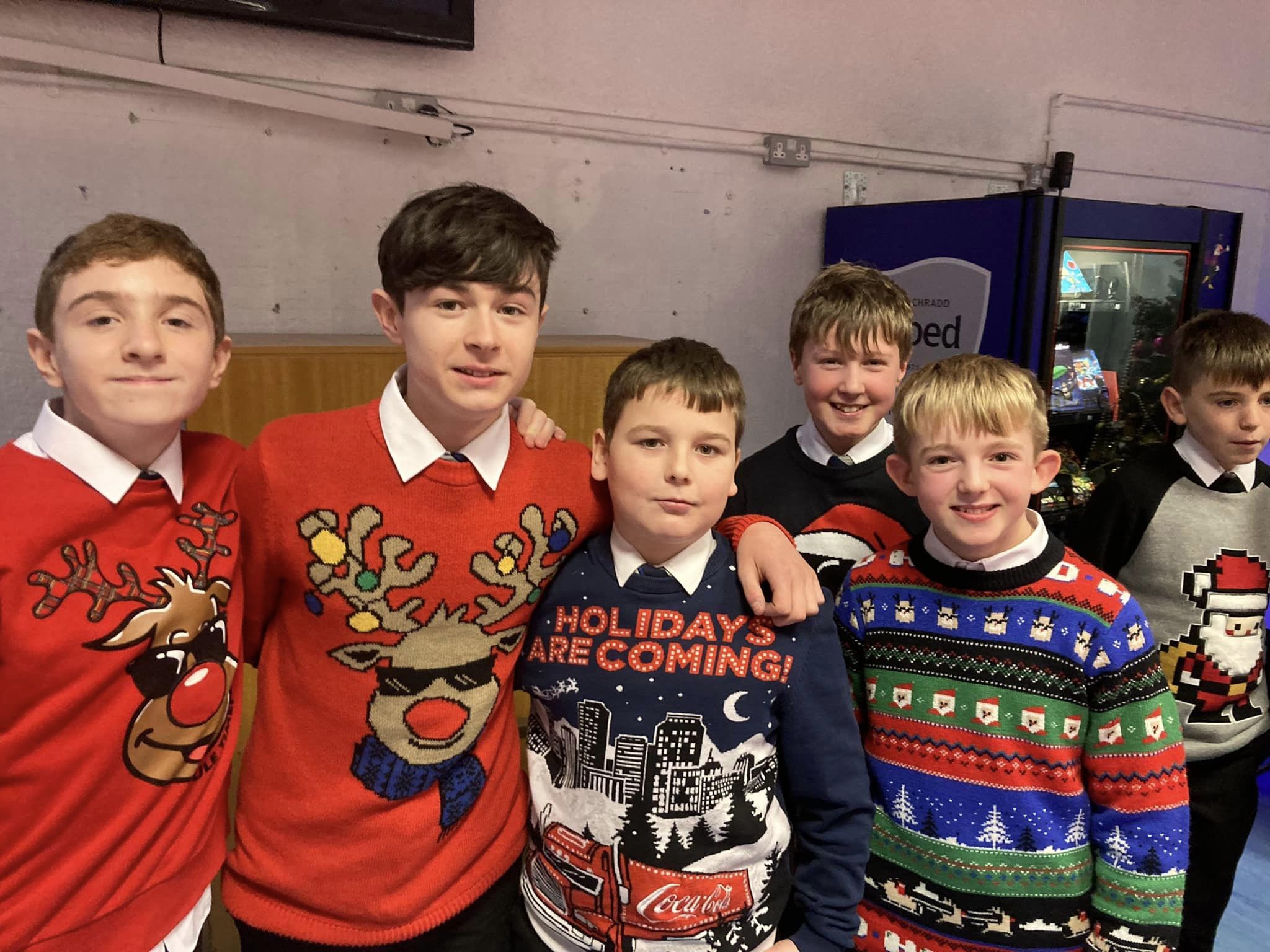 A group of boys in their Christmas jumpers.