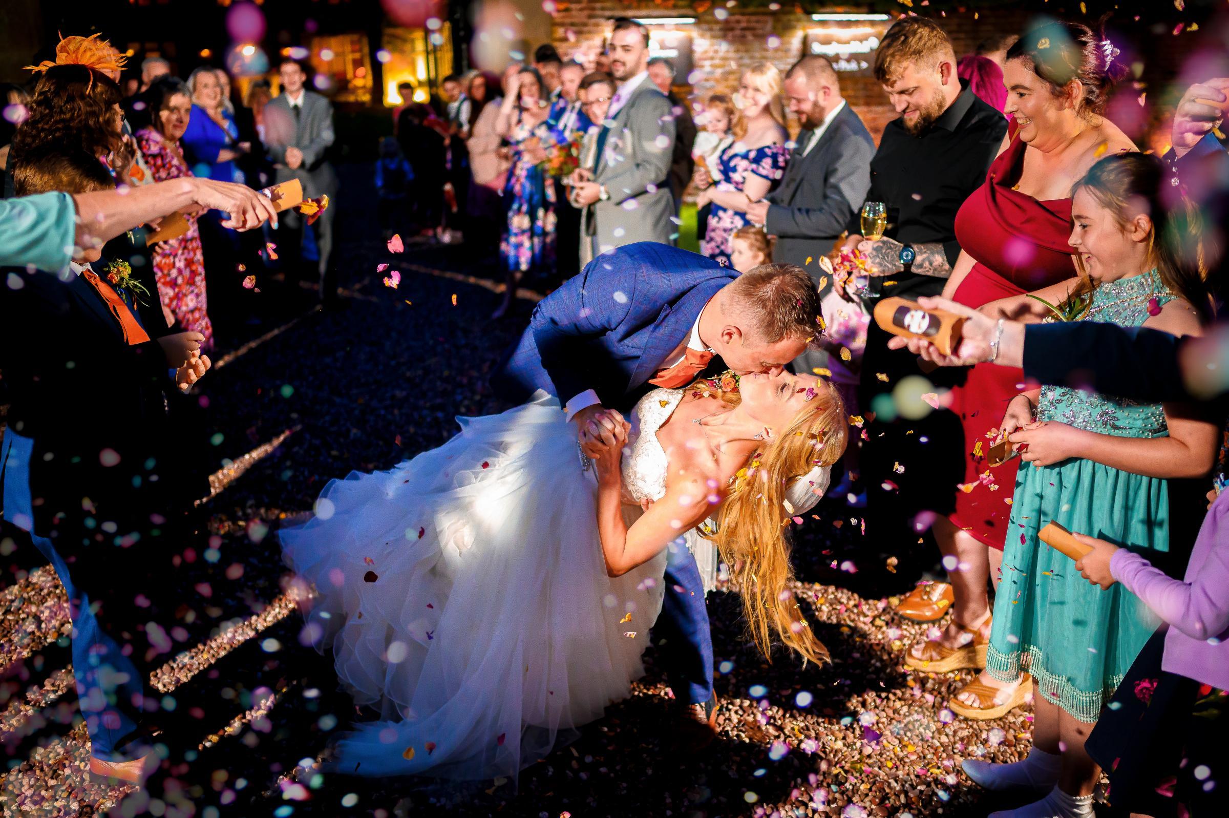 It rained all day but managed to stop when it got dark. Photographer Joe managed to capture every single bit of colour for this confetti shot.