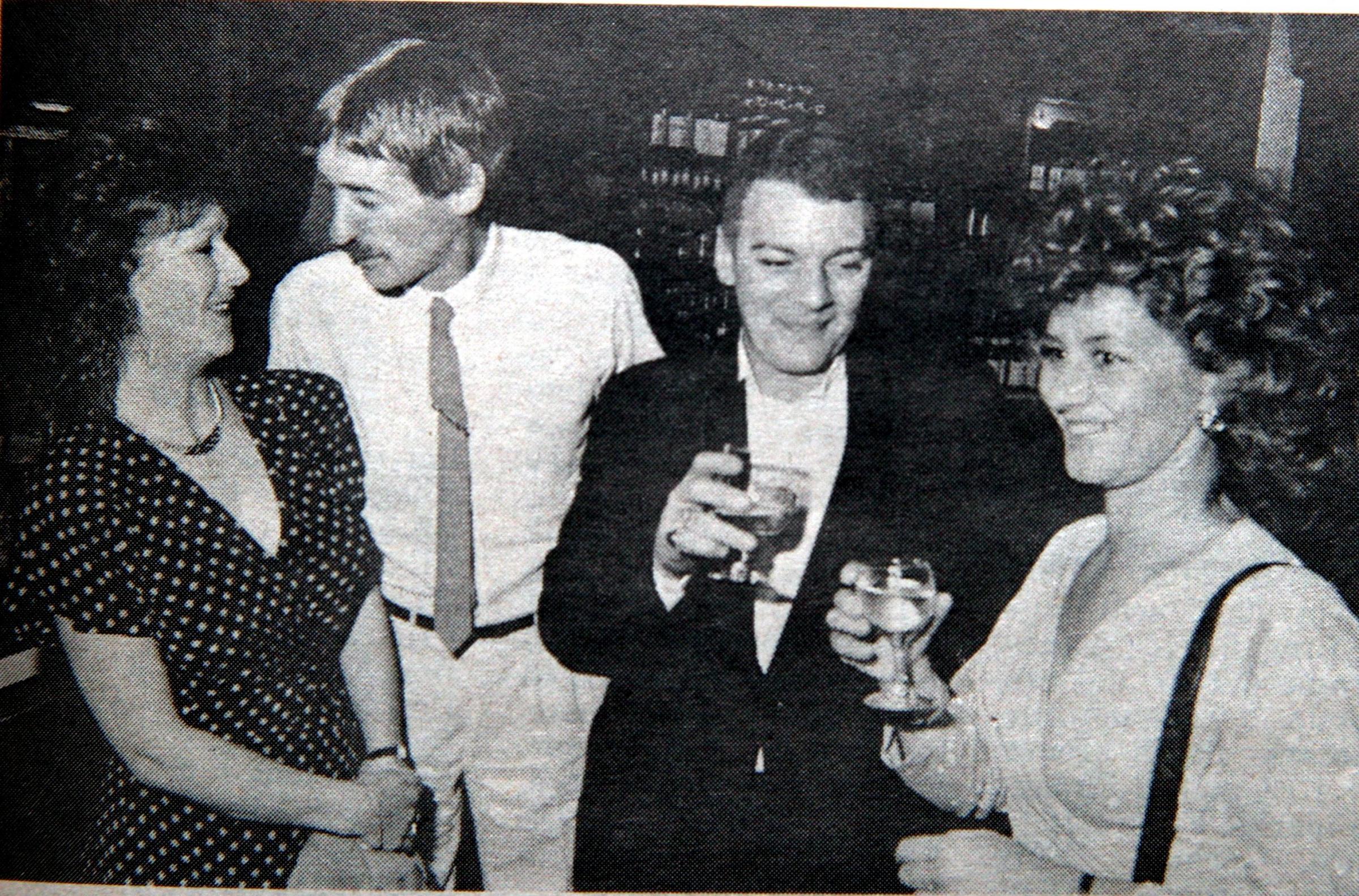 Opening of Scotts, October 1989 - Sharing a joke are Karen Hughes, Neville Owen, Pete Jones and Kathy Guy.