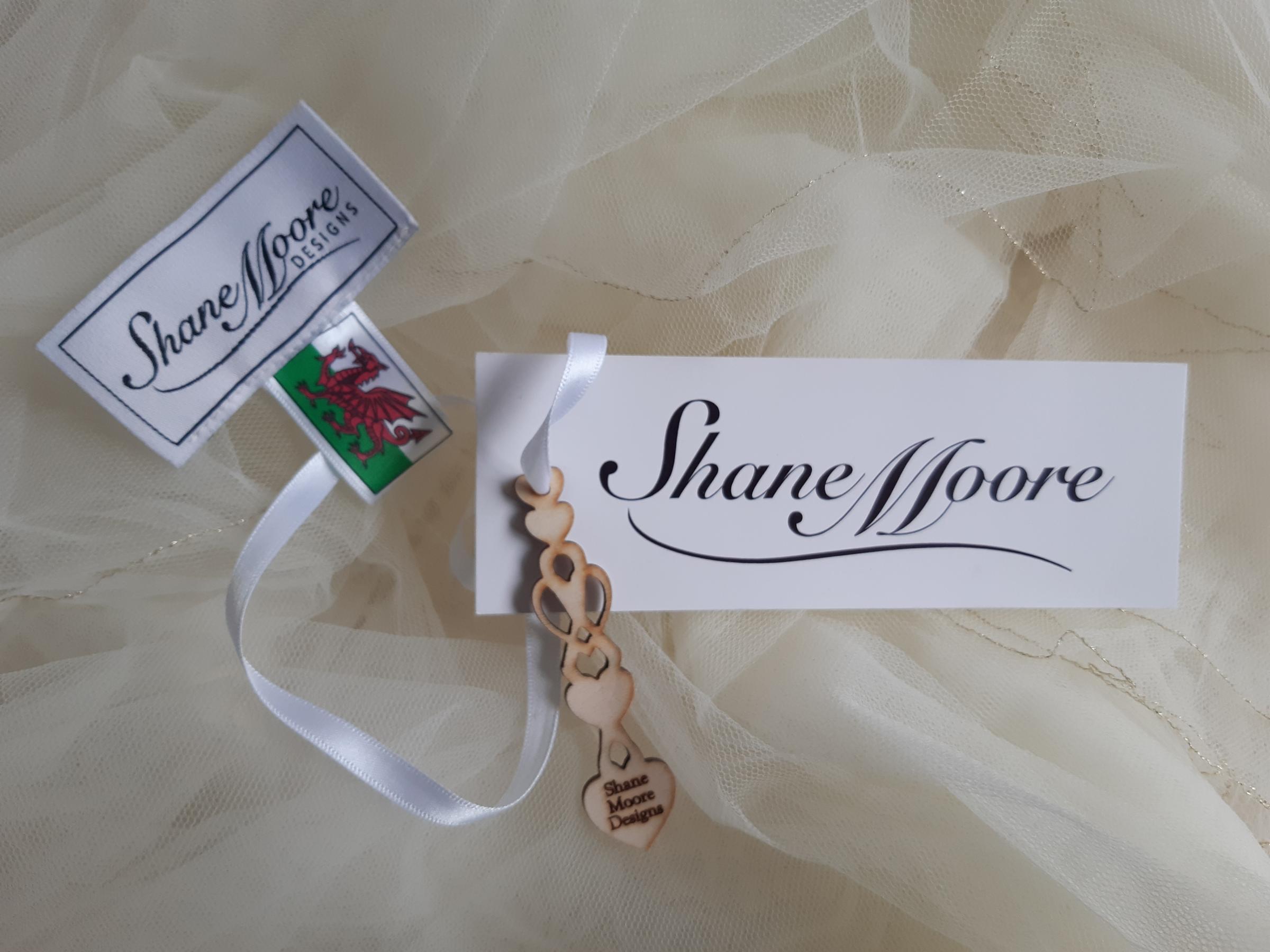 The love spoon and Welsh flag Shane Moore Designs label added to each wedding dress.