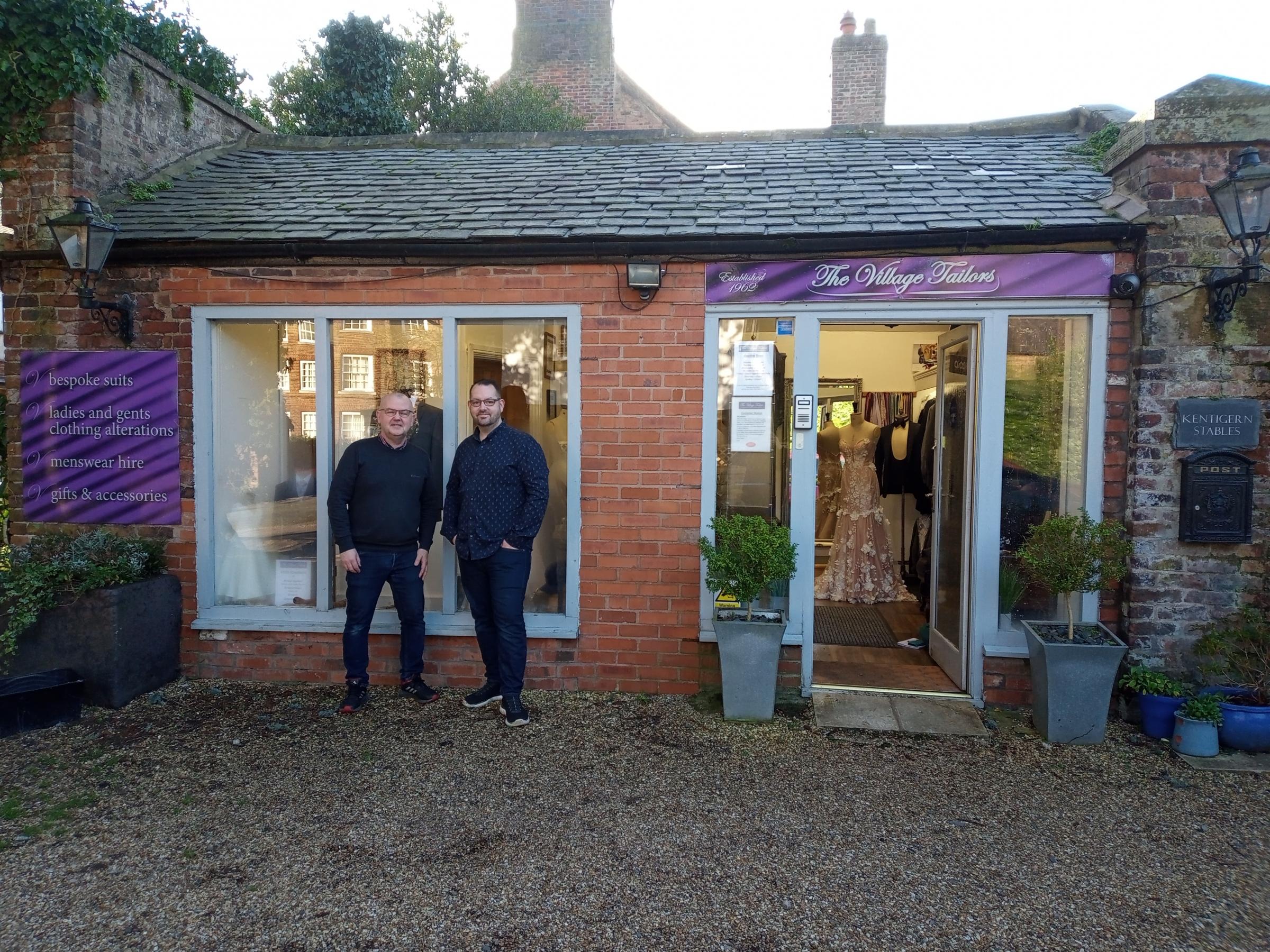 Mark Rogers and Shane Moore outside The Village Tailors in Hawarden.