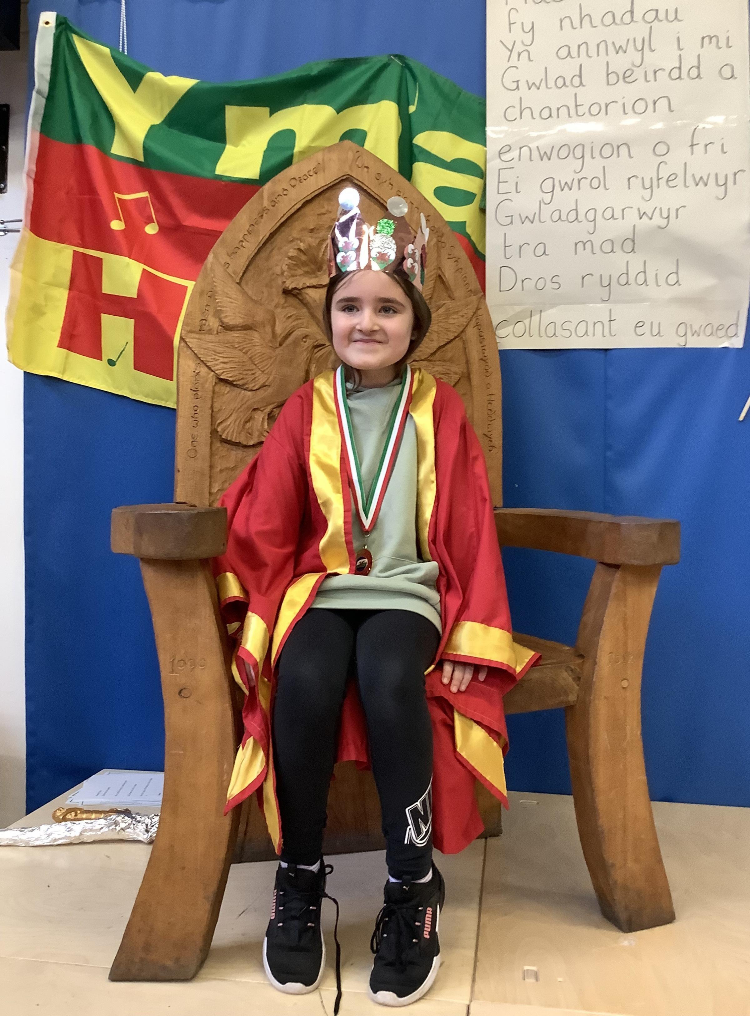 Hannah Kuc, Year 4, in the Eisteddfod chair at St Annes Catholic Primary School.