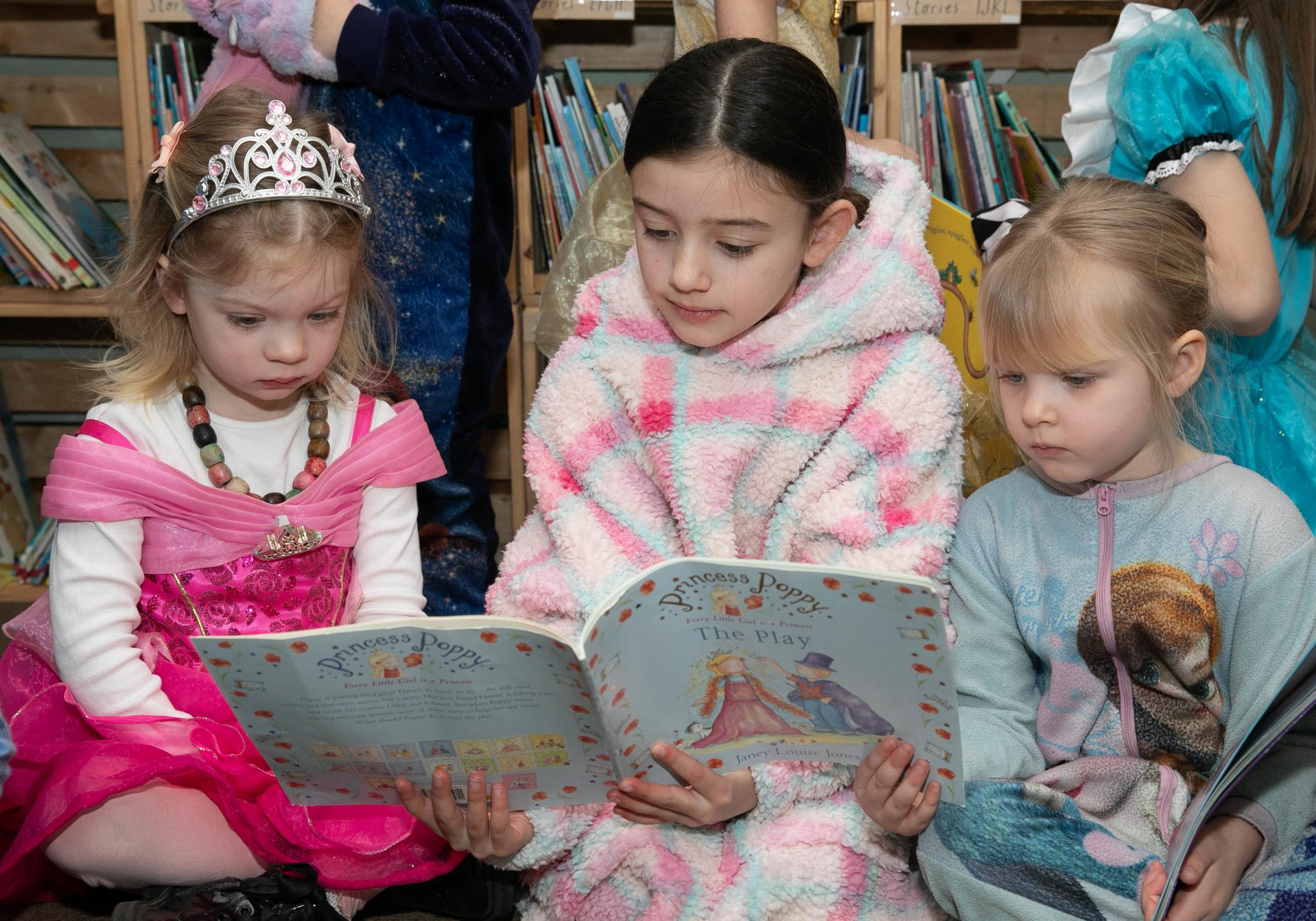 Ysgol Parc y Llan Reading Buddies Rosie,Kaya and Skyla.