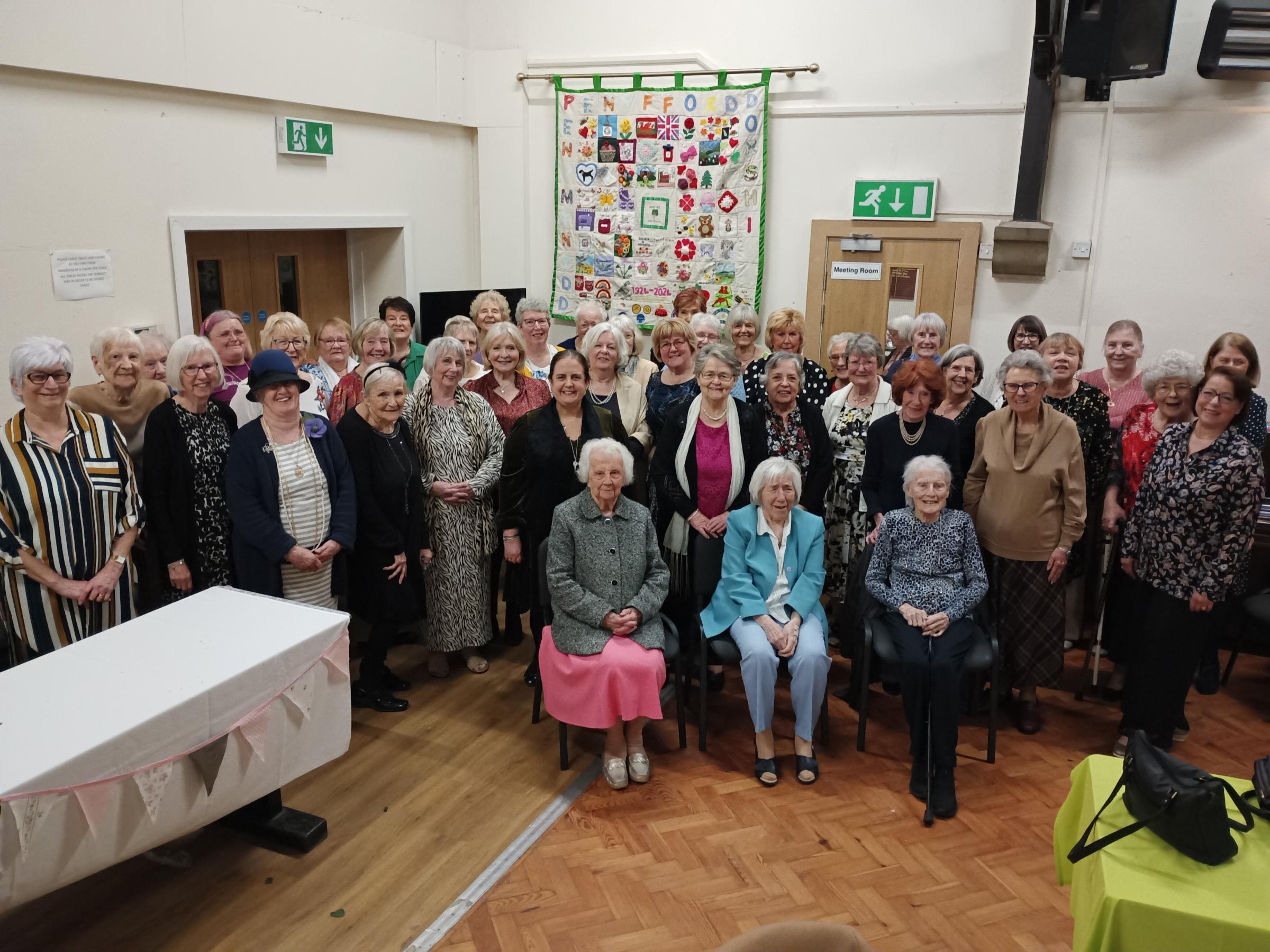 Penyffordd, Penymynydd and Dobshill WI and guests gather for the centenary celebrations.