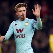 Aston Villa's Jack Grealish applauds fans after the Premier League match at Vicarage Road, Watford..