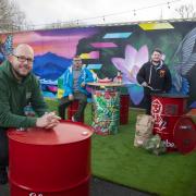 From left; Mike Trow, of Lock Stock Self Storage, Rob Randall and Nathan Pearson of 45 Gallon Drums, with artist Sam Porter. [Picture: Mandy Jones]