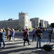 Members of the press and general public outside Windsor Castle, ahead of the funeral of the Duke of Edinburgh taking place in St George's Chapel, at Windsor Castle, Berkshire, this afternoon. Picture date: Saturday April 17, 2021.