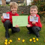 From left; Archie and Fraser Wright – both aged eight – have raised over £220 by raffling off their own Easter treats for a school in Kenya