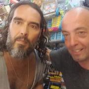 Russell Brand poses for a photo with Rhayader town councillor Will 'Wiz' Davies