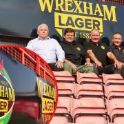 Wrexham AFC CEO Fleur Robinson (right) and commercial manager Geoff Scott (right) celebrate the Wrexham Lager deal with Vaughan, Mark and Jon Roberts from the brewery