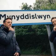 Ant and Dec posed on Instagram with the Welsh Mynyddislwyn sign in the background. Picture: Instagram / antanddec