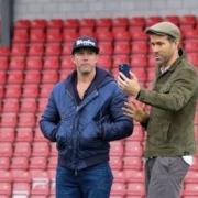 Ryan Reynolds and Rob McElhenney on the pitch at The Racecourse in Wrexham. Images: Wrexham AFC/Gemma Thomas
