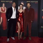 Dwayne Johnson, Gal Gadot and Ryan Reynolds at the premiere of Red Notice.