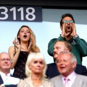 Blake Lively and Ryan Reynolds cheer on the Reds at Wembley.