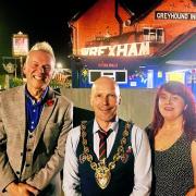 Darren Nixon, Former Mayor Ronnie Prince and Beverley Davies in front of They Greyhound Inn.