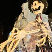 Saturnalia and Winter Watch parade led by giant skeletons from Chester Town Hall.