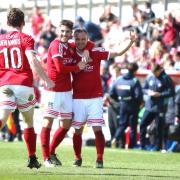 Wrexham V Braintree ( finished 2 -3 ) 23rd April 2016 . Connor Jennings Rob Evans and Lee Fowler celebrate Wrexham'sd 2nd goal.