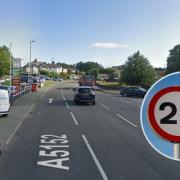 Main image of the A5152 Chester Road in Wrexham / Inset of a 20mph sign.