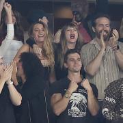 Taylor Swift, Blake Lively and Ryan Reynolds react during an NFL football game between the New York Jets and the Kansas City Chiefs.