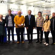 Aura Wales chair Sara Mogel with Aura's CEO Mike Welch and Board members at the ice arena in Deeside.