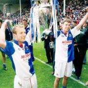 Blackburn's Chris Sutton and Alan  Shearer with Premier League trophy in 1995.