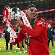 Manchester United's Casemiro lifts the trophy after the Carabao Cup Final match at Wembley Stadium, London. Picture date: Sunday February 26, 2023..