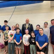 The Mayor of Wrexham Andy Williams with Rossett Swimming Club members.