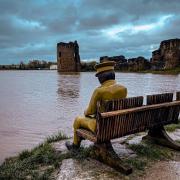 The high tide caused flooding at Flint Castle on Tuesday.