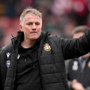 Wrexham manager Phil Parkinson celebrates after beating Stockport