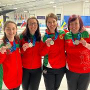 The Wales women's curling team with their medals
