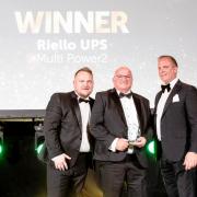 Riello UPS's sales and marketing manager Barry Jarvis (left) and managing director Leo Craig (centre) receive the UPS Product of the Year award from Jonathan Pritchard of GS Yuasa.