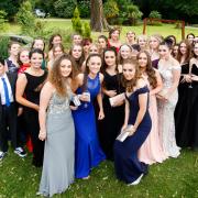 Ysgol Maes Garmon hold their Prom Night at Highfield Hall in Northop. Pic: The girls get together for a group photo. GA150618H.