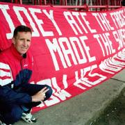 FAMOUS: Joey Jones with 'THAT' banner