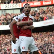 Arsenal's Pierre-Emerick Aubameyang (right) celebrates scoring his side's first goal of the game during the Premier League match at Emirates Stadium, London. PRESS ASSOCIATION Photo. Picture date: Sunday December 2, 2018. See PA story SOCCER