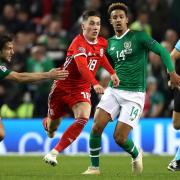 Wales' Harry Wilson (centre left) Republic of Ireland's Callum Robinson (centre right) battle for the ball during the UEFA Nations League, League B, Group four match at The Aviva Stadium, Dublin.