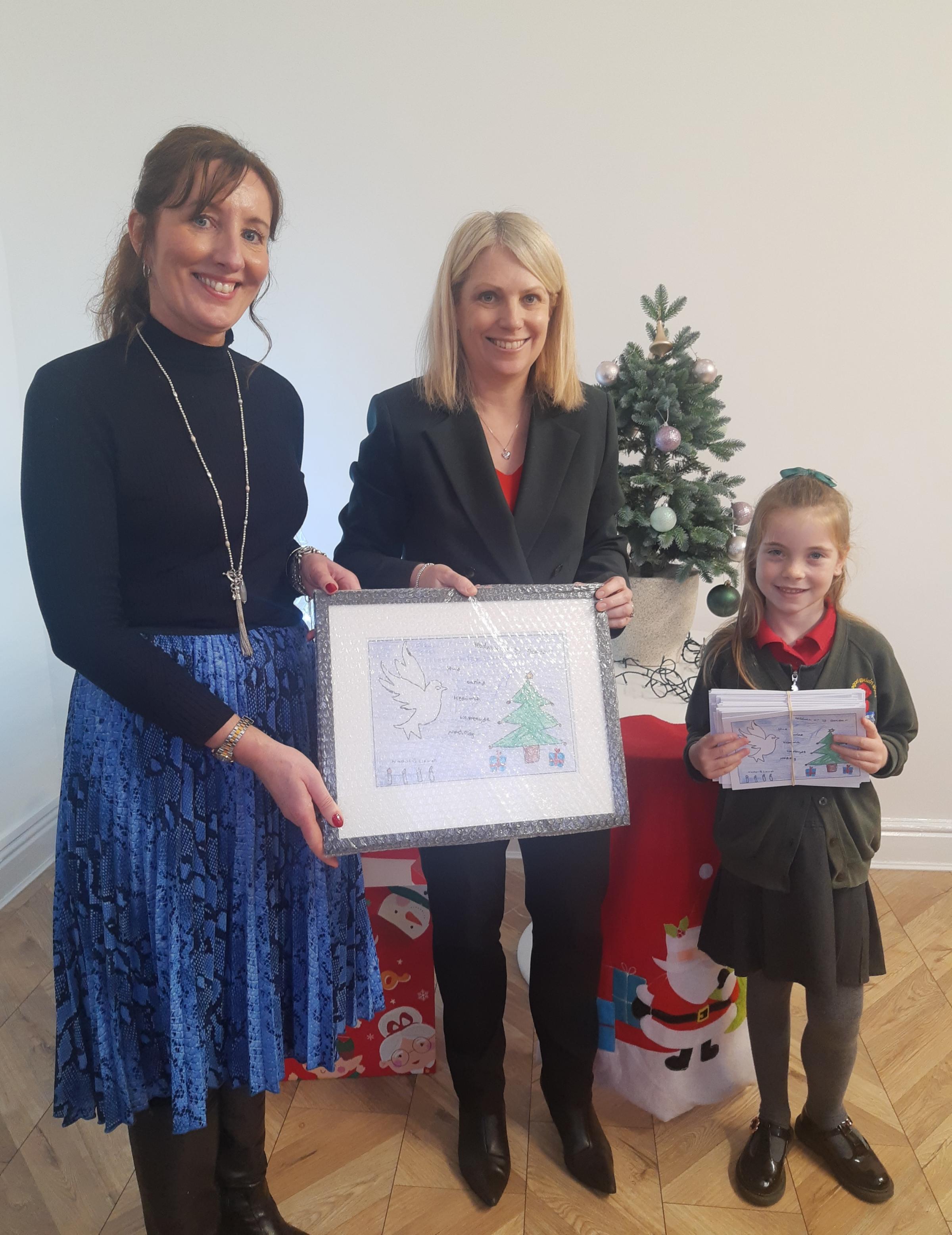Hannah Blythyn MS with overall winner Hallie Roberts of Ysgol Croes Atti, Flint, with her design and Alison Roberts from Nice-Pak International.