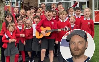 The children of Ysgol Y Waun are hoping to get former pupil Jonny Buckland back for their anniversary.