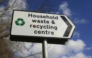A recycling centre sign.