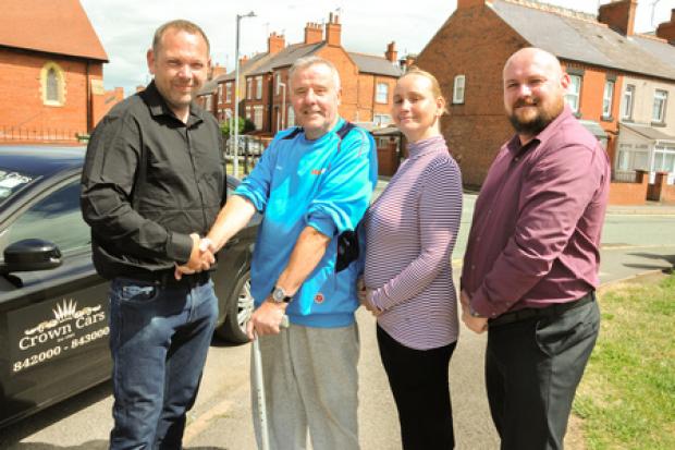Taxi driver Mark Jones, Dave Jenkins, receptionist Debbie Rogers and Andy Roberts, proprietor of Crown Taxi cars